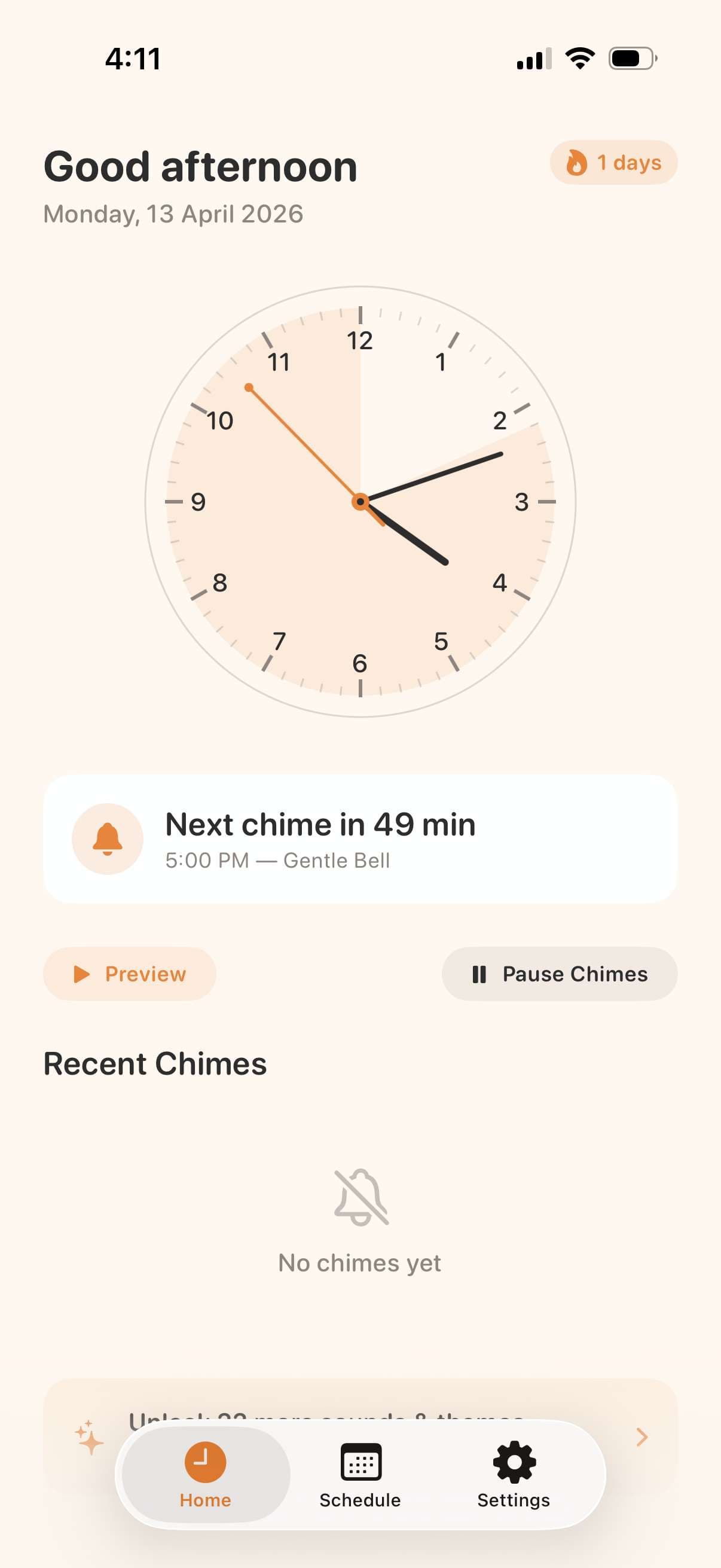TimeAware home screen with an analog clock and an arc counting down to the next hourly chime